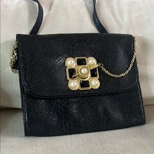 Elegant Black Handbag with Gold Accents